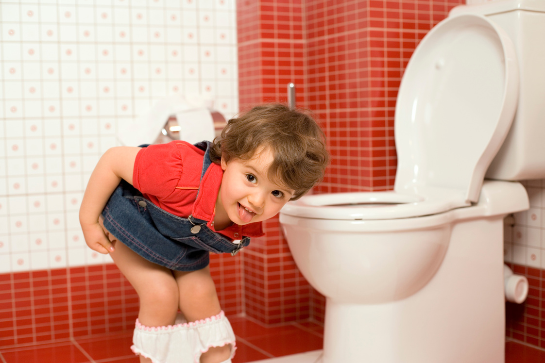 Girl using toilet